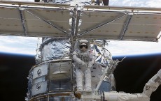 NASA Astronaut Works On Hubble Space Telescope Credit: NASA / Handout