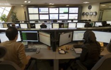 Technicians monitor data flow in the control room of an internet service provider in Tehran .