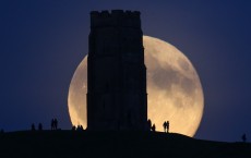 Blue Moon Rises Over Glastonbury Tor