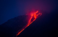 Hot lava runs down Mount Sinabung