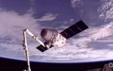 Dragon capsule docks with ISS