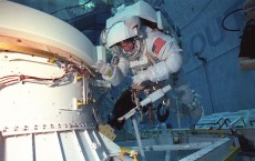 Astronaut Daniel T Barry Mission Specialist Wears A Training Version Of The Extravehicular Mobili 