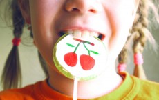 Child Eating Lollipop