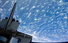 Space Shuttle Discovery Continues On Its Last Mission