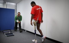 This is a photograph of a runner with leg prosthetic just before he competes at the London Paralympics.