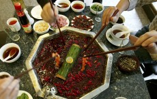 Chinese People Enjoy Hot Pot At A Restaurant