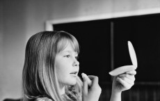 Young Girl Putting On Make Up