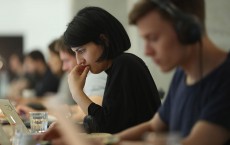 Woman Working with Colleagues