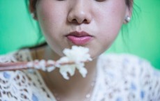 Girl Eating Rice