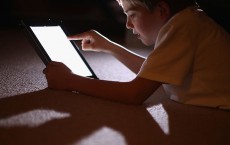 Children Interacting With Tablet Technology