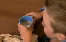 A Child Drinking Coffee