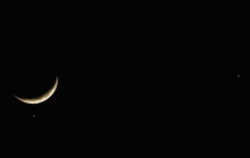 Planet Venus Appears Close To Crescent Moon