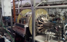 fusion driven rocket test chamber at the UW Plasma Dynamics Lab in Redmond. The green vacuum chamber is surrounded by two large, high-strength aluminum magnets