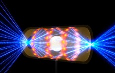 NIF target pellet inside a hohlraum capsule with laser beams entering through openings